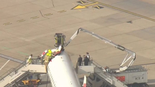 
                              Extinction Rebellion protester climbs on plane at London City Airport
                      