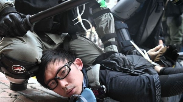 Hong Kong to ban protesters from wearing masks, Carrie Lam confirms
Hong Kong to ban protesters from wearing masks, Carrie Lam confirms