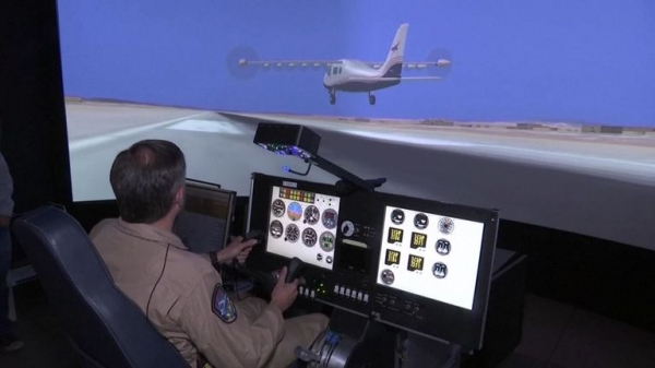 
                              NASA unveils early version of all-electric plane 
                      